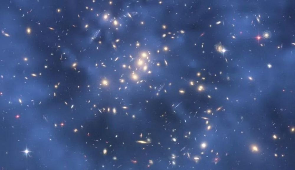 Esta imagen compuesta del Telescopio Espacial Hubble muestra un anillo fantasmal de materia oscura en el cúmulo de galaxias Cl 0024 + 17. Esta imagen compuesta del Telescopio Espacial Hubble muestra un anillo fantasmal de materia oscura en el cúmulo de galaxias Cl 0024 + 17.