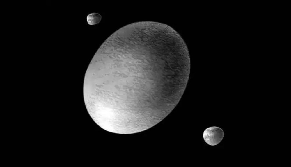 Representación artística de Haumea y sus lunas. Representación artística de Haumea y sus lunas.