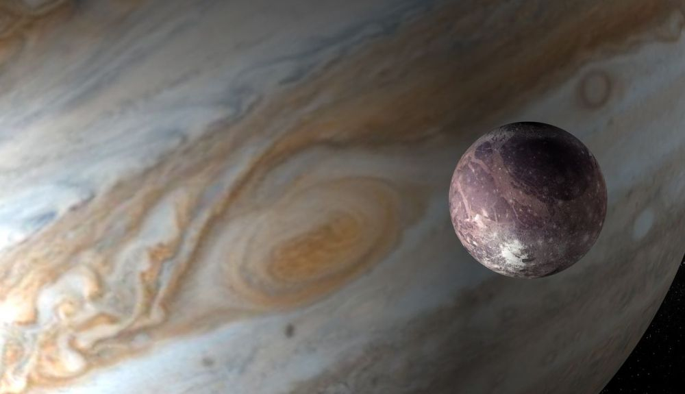 Júpiter y su satélite Gaímede en el espacio exterior. Júpiter y su satélite Gaímede en el espacio exterior.