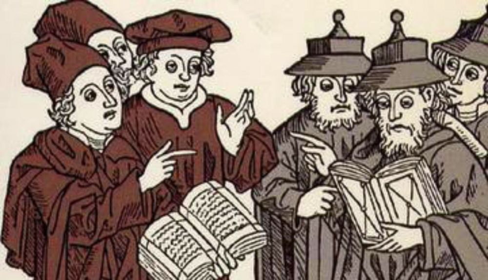 Imagen de eruditos cristianos discutiendo con judíos, que portan el sombrero puntiagudo que los identificaba. Bibliotec Nacional de Israel. Imagen de eruditos cristianos discutiendo con judíos, que portan el sombrero puntiagudo que los identificaba. Bibliotec Nacional de Israel.