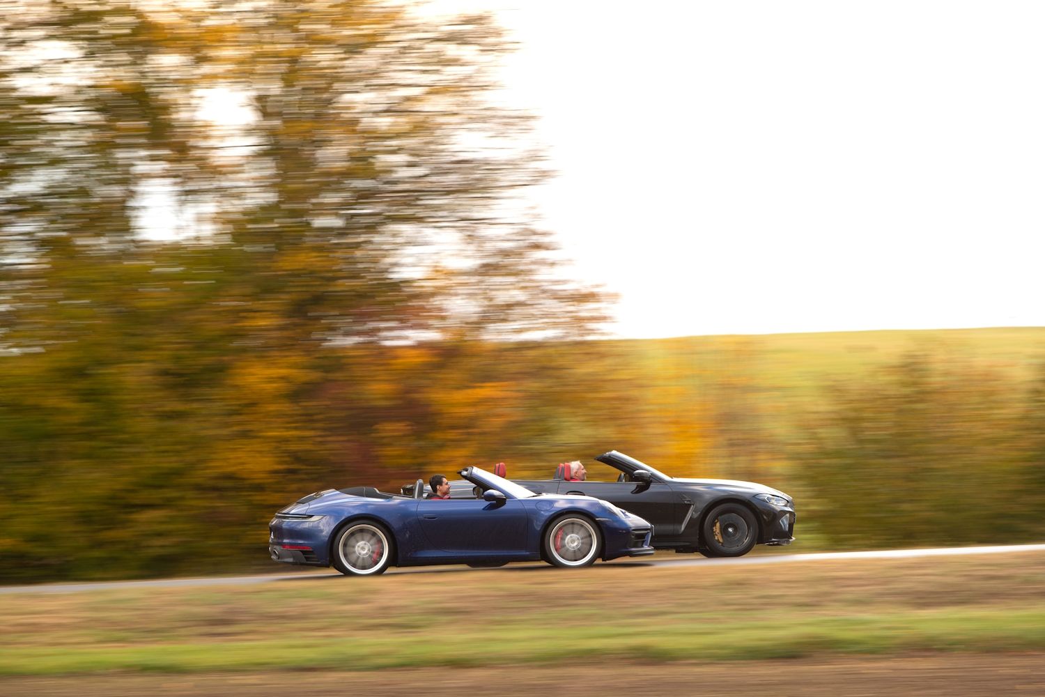 BMW M4 Competition Xdrive Cabrio vs Porsche 911 Carrera 4 GTS Cabrio