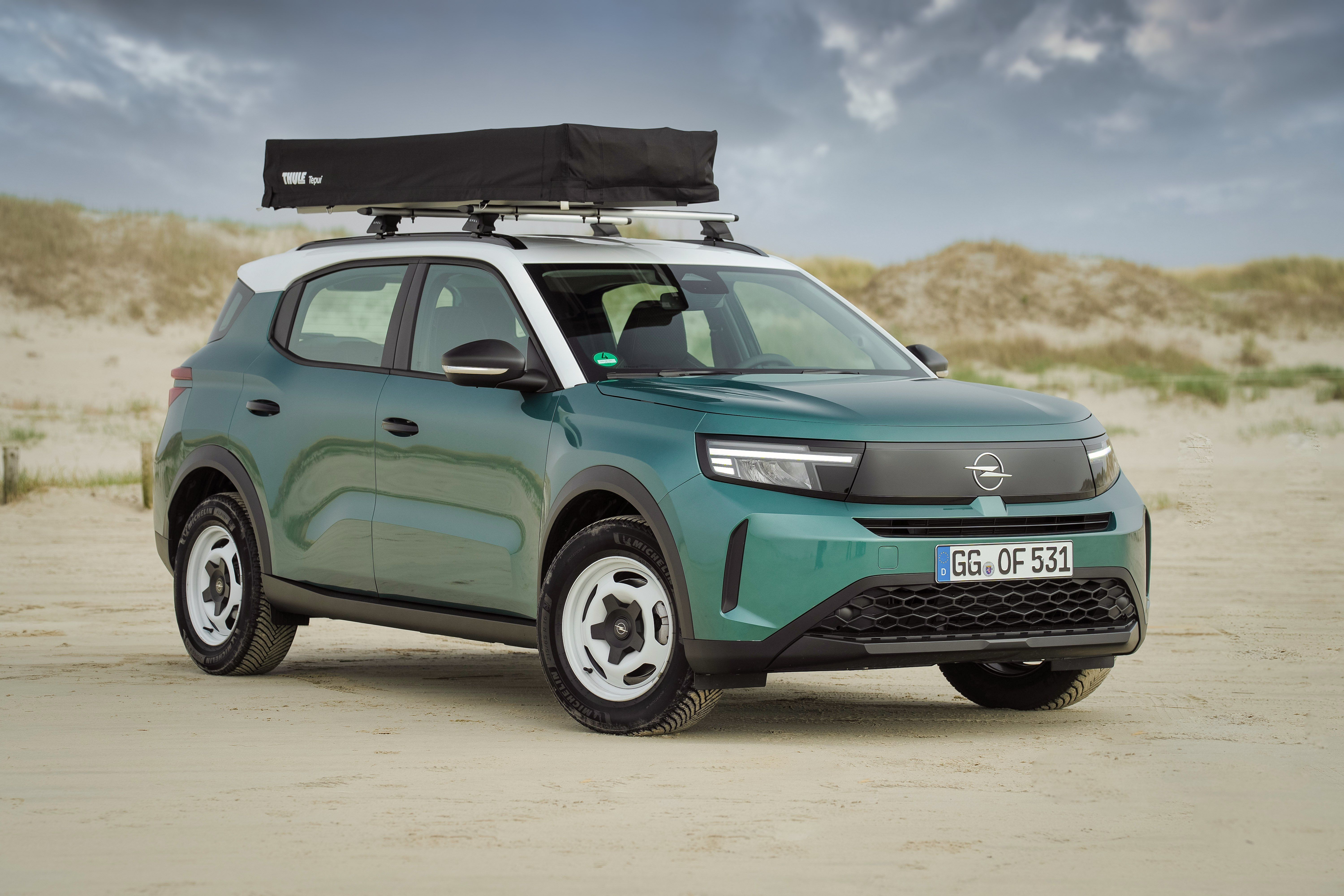 Opel Frontera con tienda de campaña Thule