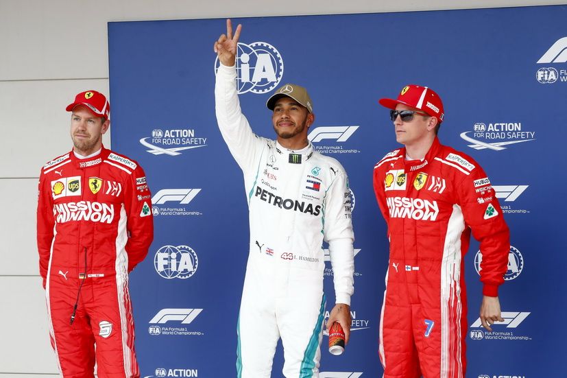 Los tres pilotos del podio: Raikkonen, Verstappen y Hamilton