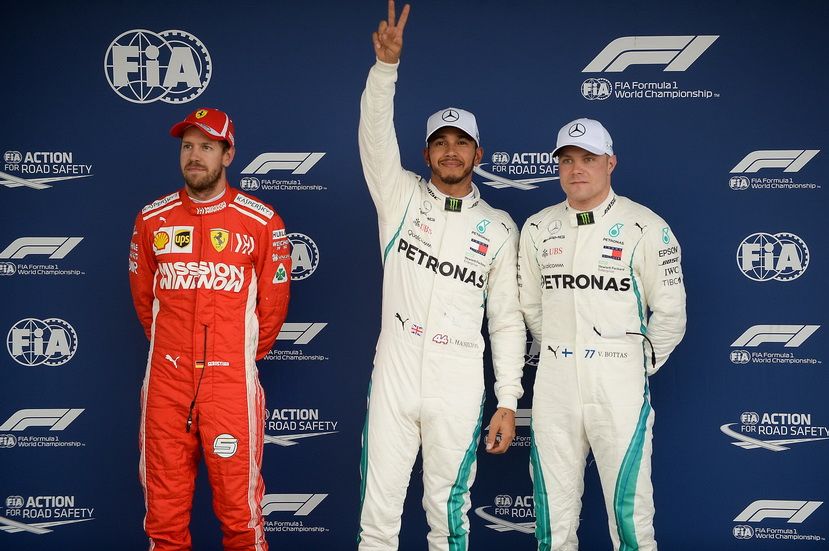 Los tres primeros pilotos de la calificación: Hamilton, Vettel y Bottas