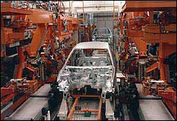 Las compañías automovilísticas alemanas recortarán empleo en España en 2003