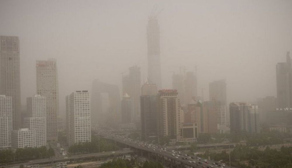 El cielo de una ciudad china altamente contaminado. El cielo de una ciudad china altamente contaminado.
