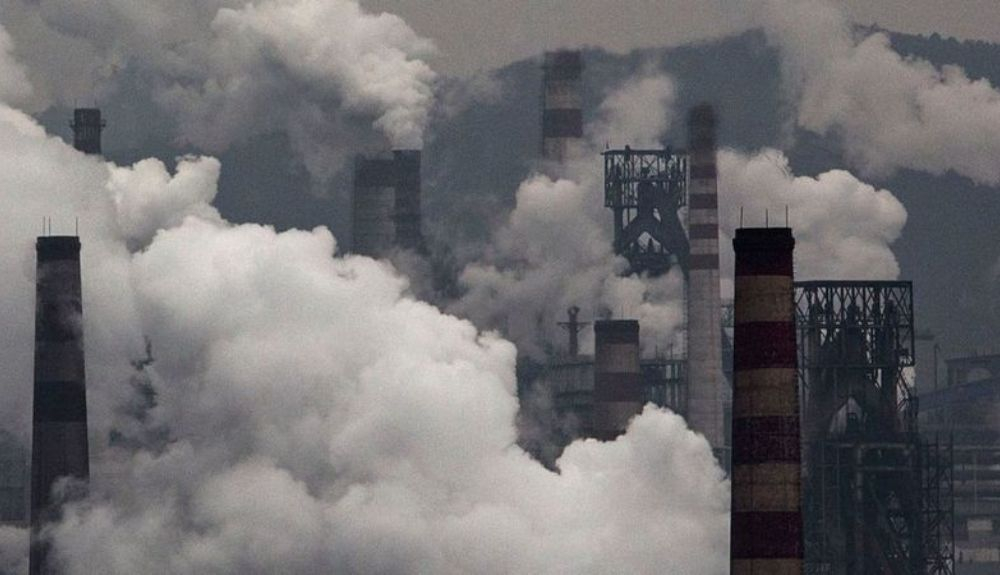 E,isión de gases de una fábrica en China. E,isión de gases de una fábrica en China.